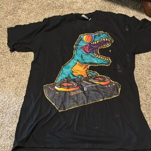 2 Tshirts size Medium one Dino one DJ